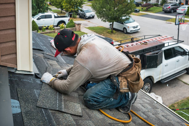 Professional Roofing technician working in Arlington, IL